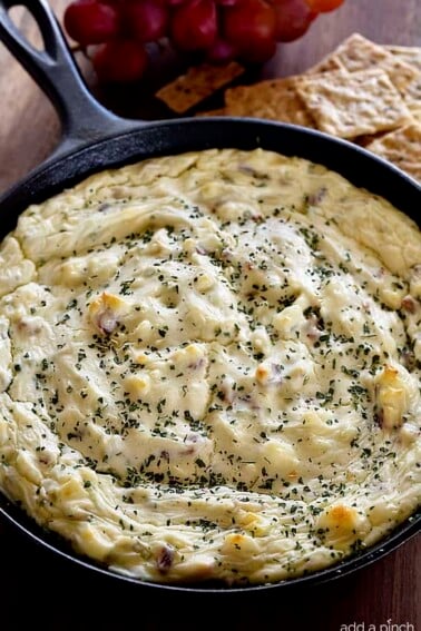 Bacon Blue Cheese Dip Recipe - This Bacon Blue Cheese Dip recipe makes a flavorful dip recipe! Baked in a skillet, this delicious dip is perfect for so many occasions! // addapinch.com