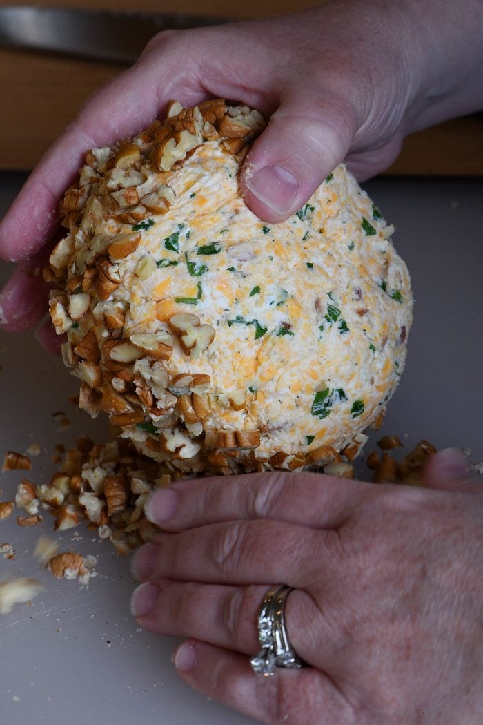 Bacon Ranch Cheese Ball Recipe - This creamy, dreamy cheese ball melds together bacon, ranch seasoning, and is the encased in chopped pecans. Perfect for easy entertaining! // addapinch.com