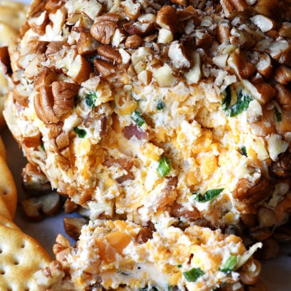 Bacon Ranch Cheese Ball Recipe - This creamy, dreamy cheese ball melds together bacon, ranch seasoning, and is the encased in chopped pecans. Perfect for easy entertaining! // addapinch.com