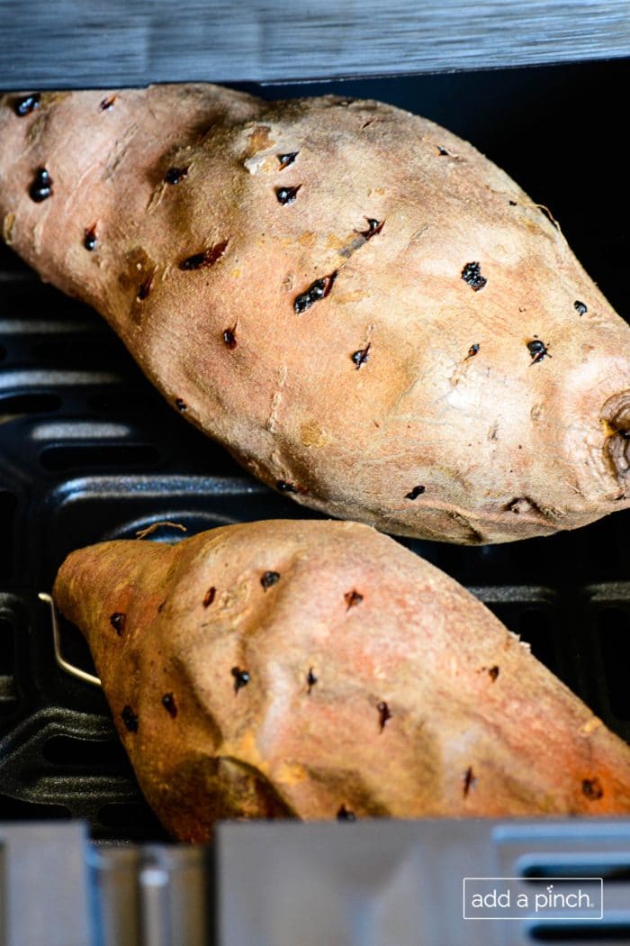 Photograph of baked sweet potatoes.