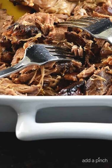 This Slow Cooker Balsamic Pork Roast makes for a family favorite meal that everyone will love. So simple and so full of flavor! // addapinch.com