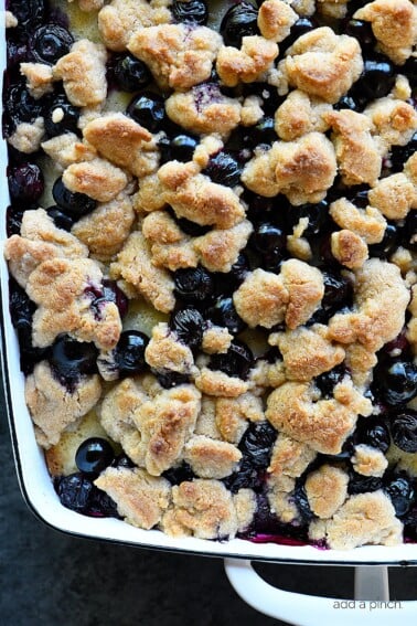 Blueberry Coffee Cake Recipe with Crumb Topping - Made with fresh blueberries and a delicious crumb topping, this blueberry coffee cake is always a favorite! Perfect for breakfast, brunch, or dessert! // addapinch.com