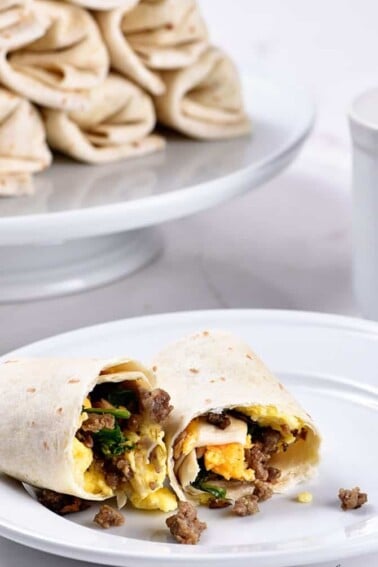 Make-Ahead Breakfast Burritos Recipe - Stock your freezer with these easy make-ahead breakfast burritos for even easier mornings! // addapinch.com