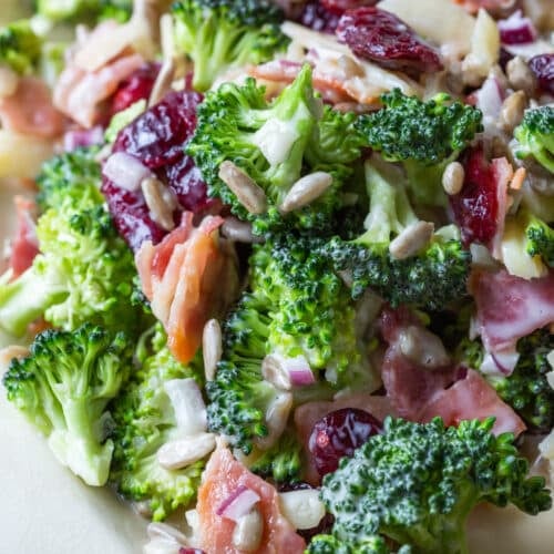 Photo of broccoli salad on a white platter.