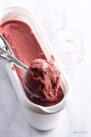 Cherry Frozen Yogurt Recipe - Cherry Frozen Yogurt makes a delicious and refreshing dessert in minutes! Ready in just 6 minutes! // addapinch.com