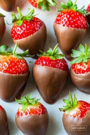 Platter filled with chocolate covered strawberries.