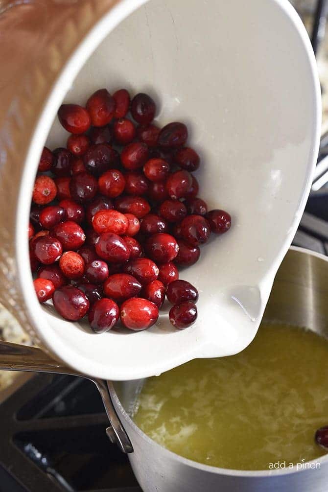 Classic Cranberry Sauce Recipe - This cranberry sauce recipe is a classic holiday recipe. Made of fresh cranberries, orange zest and juice, this cranberry sauce recipe is a must make! // addapinch.com