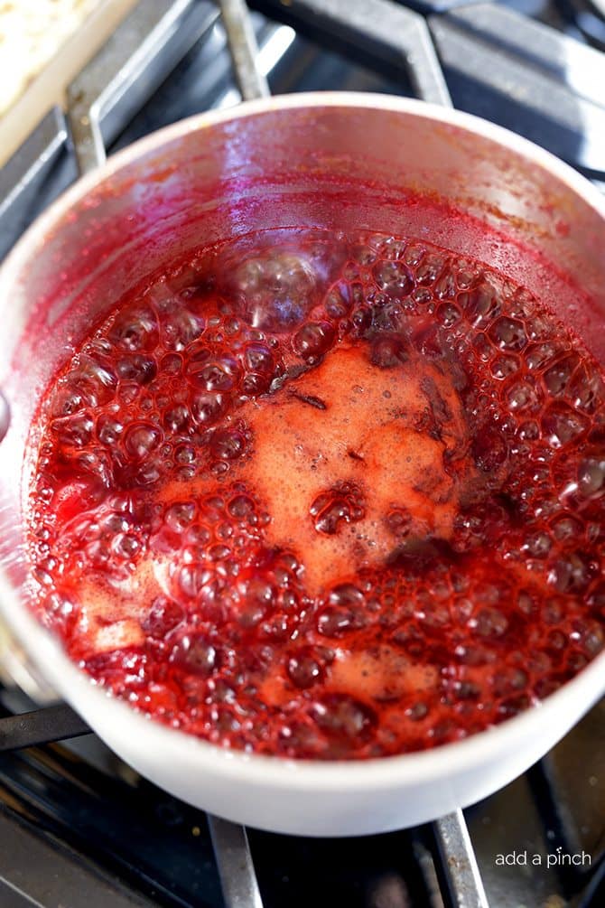 Classic Cranberry Sauce Recipe - This cranberry sauce recipe is a classic holiday recipe. Made of fresh cranberries, orange zest and juice, this cranberry sauce recipe is a must make! // addapinch.com