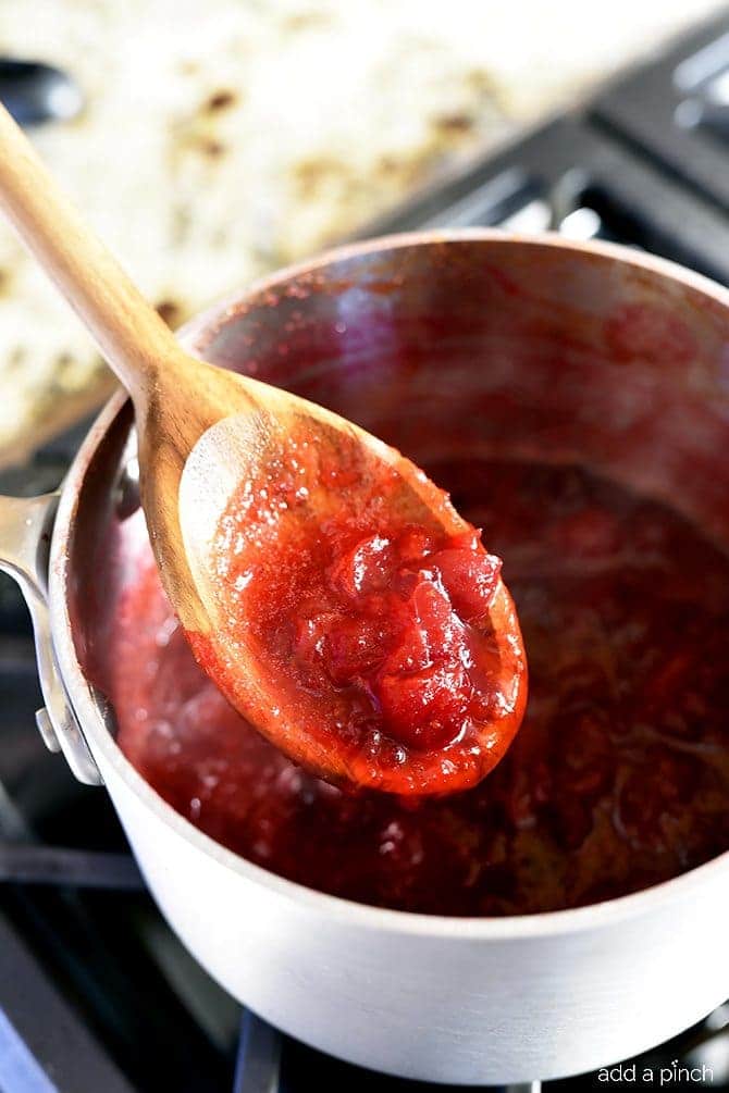 Classic Cranberry Sauce Recipe - This cranberry sauce recipe is a classic holiday recipe. Made of fresh cranberries, orange zest and juice, this cranberry sauce recipe is a must make! // addapinch.com