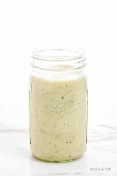 Condensed Cream of Chicken Soup - clear glass jar filled with homemade condensed cream of chicken soup. // addapinch.com