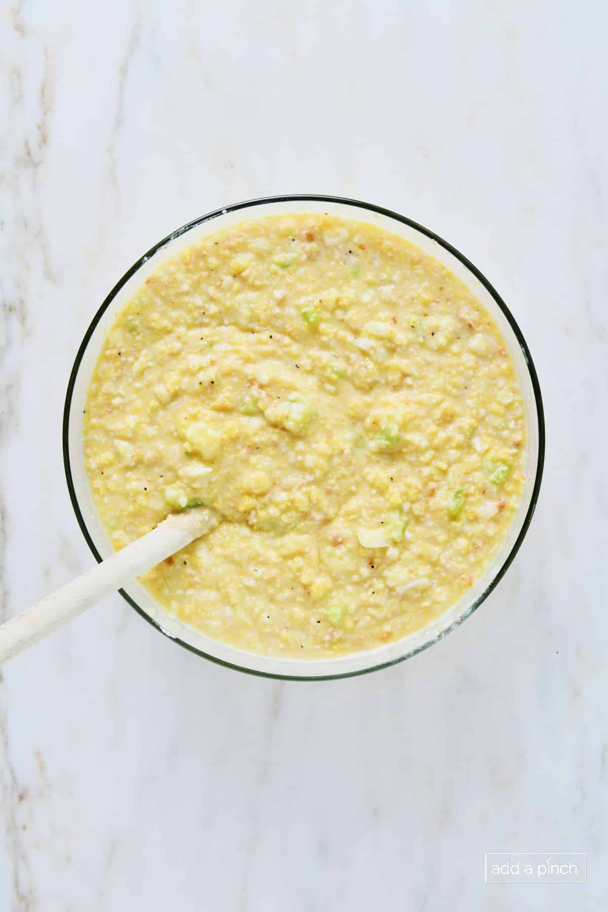 Cornbread dressing mixture ready to pour into baking dish.