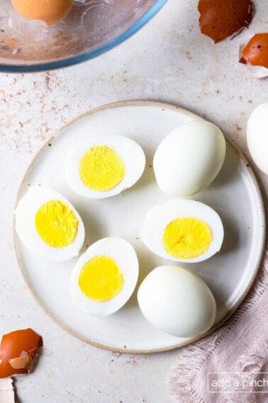 Peeling hard boiled eggs.