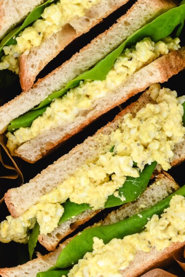 Egg Salad Sandwich Recipe - This classic egg salad sandwich recipe makes the best sandwich recipe! Light, creamy and delicious it makes the perfect quick and easy lunch or light supper.  // addapinch.com