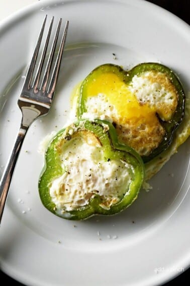 Eggs in Pepper Rings Recipe - These Eggs in Pepper Rings make a quick, easy and delicious recipe for breakfast or brunch! With just a few ingredients, you'll have a fast, fresh, and fabulous meal! // addapinch.com