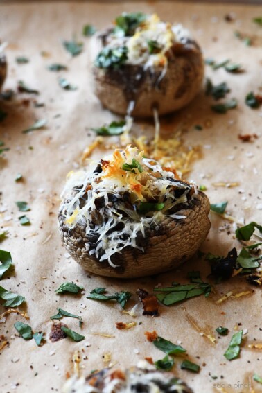 French Onion Soup Stuffed Mushrooms Recipe - My favorite French Onion Soup meets stuffed mushrooms in this delicious appetizer recipe!  // addapinch.com