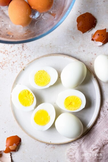 Peeling hard boiled eggs.