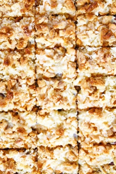 Hello Dolly Bars cut into individual square cookie bars.