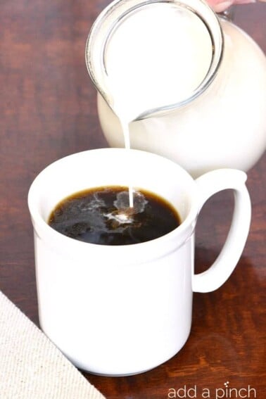 Homemade Coffee Creamer makes a quick, easy, and delicious treat for your coffee! Made with just four ingredients and ready in minutes! // addapinch.com