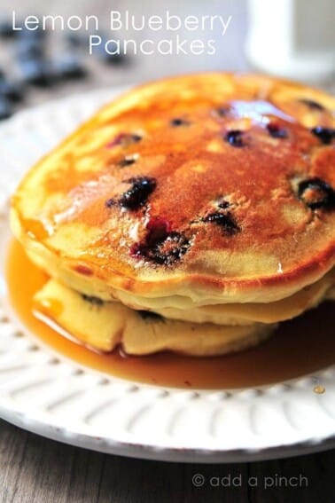 Lemon Blueberry Pancakes on a white platter.