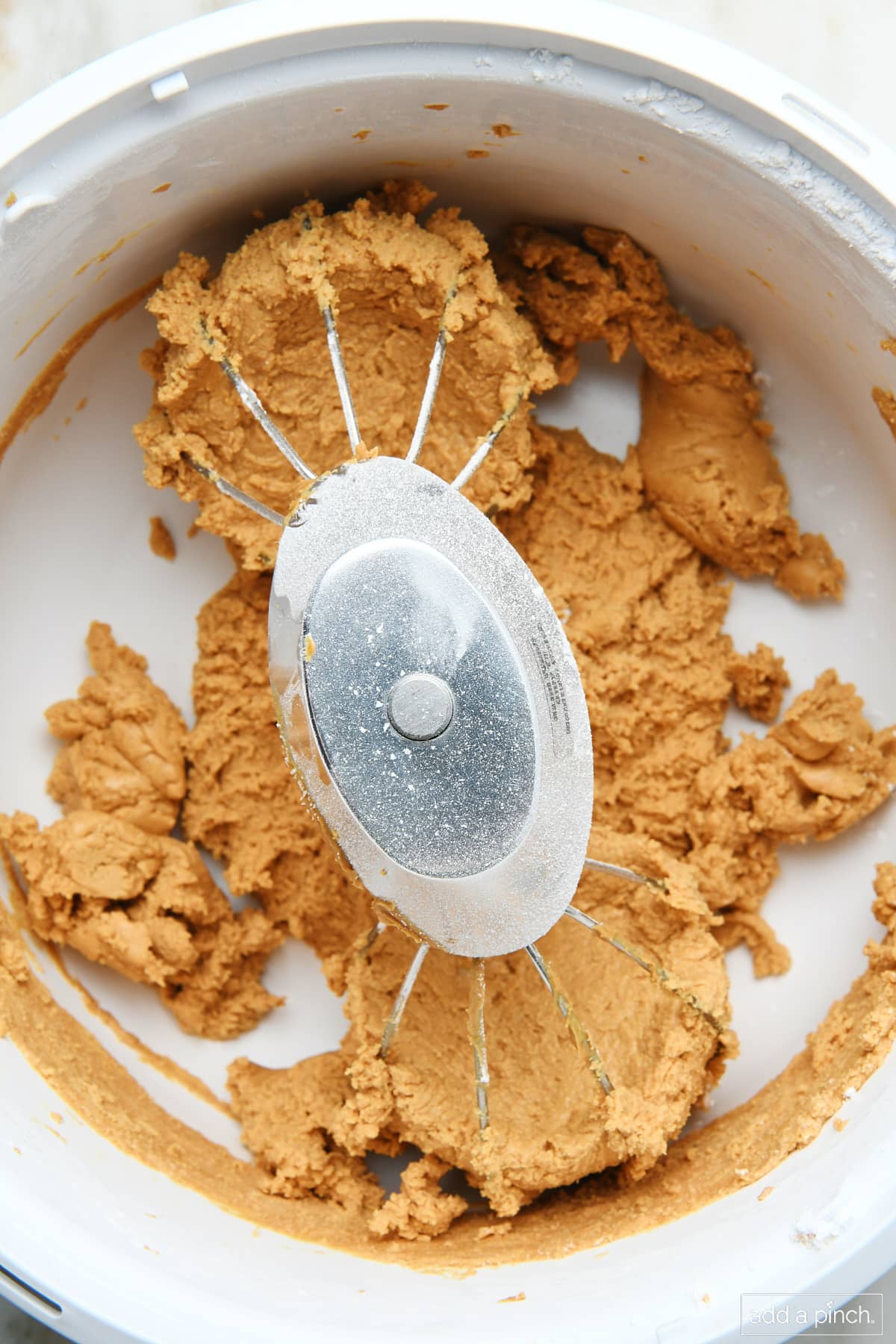 Peanut butter ball mixture in a mixing bowl.