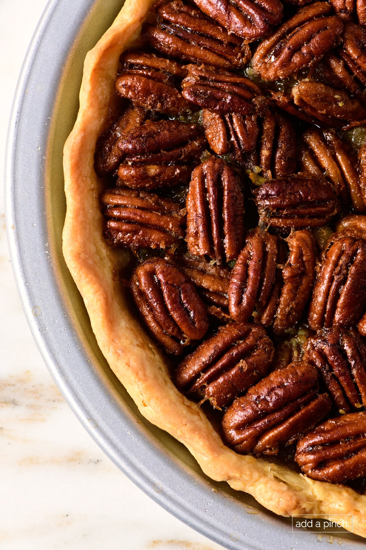 Overhead picture of baked pie with golden brown pie crust.