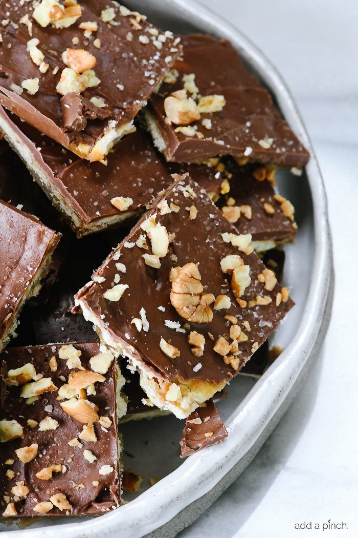 Platter of nut-covered saltine cracker toffee. 