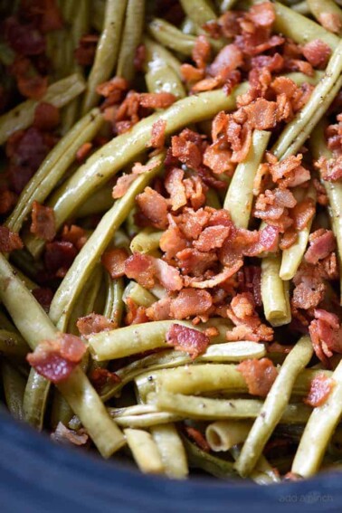 Slow Cooker Green Beans Recipe - These are the best slow cooker green beans and have everyone coming back for more! // addapinch.com