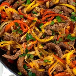 Steak Fajitas Recipe - Steak fajitas make a quick and easy meal perfect for weeknight suppers or weekend celebrations! // addapinch.com