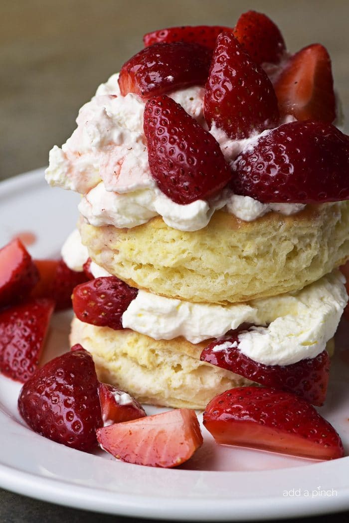 Strawberry shortcake on a white plate.