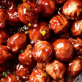 Sweet and Spicy Cranberry Cocktail Meatballs Recipe - An update on a classic party favorite, these sweet and spicy cranberry cocktail meatballs are always a hit! // addapinch.com